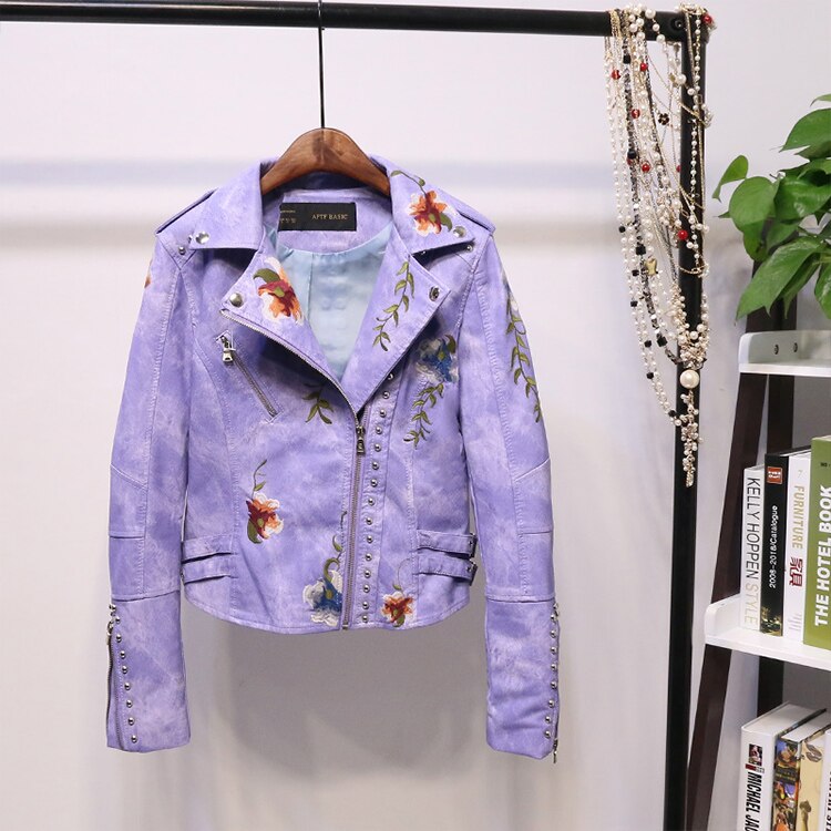Full view of a women's "Eleonora" embroidered biker jacket, a trendy outerwear piece.