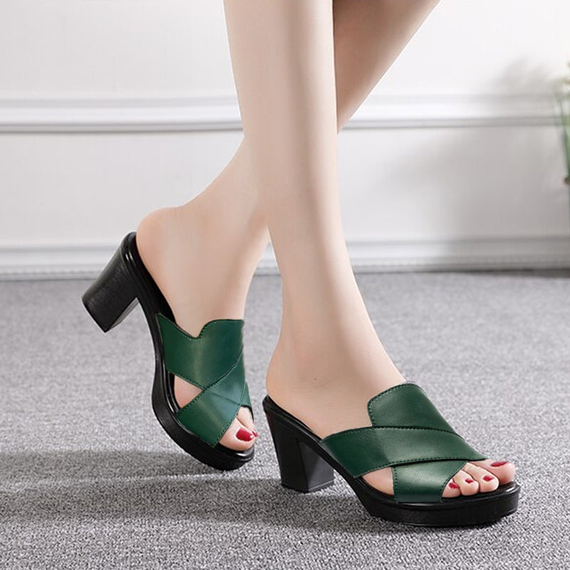 Women's fashionable platform sandals with comfortable block heel & crisscross straps. Perfect for summer elegance.