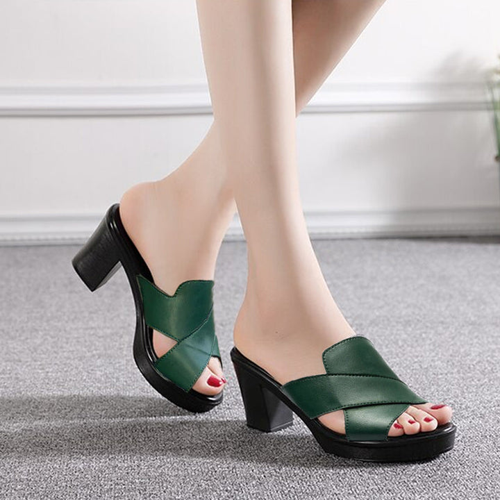 Women's fashionable platform sandals with comfortable block heel & crisscross straps. Perfect for summer elegance.