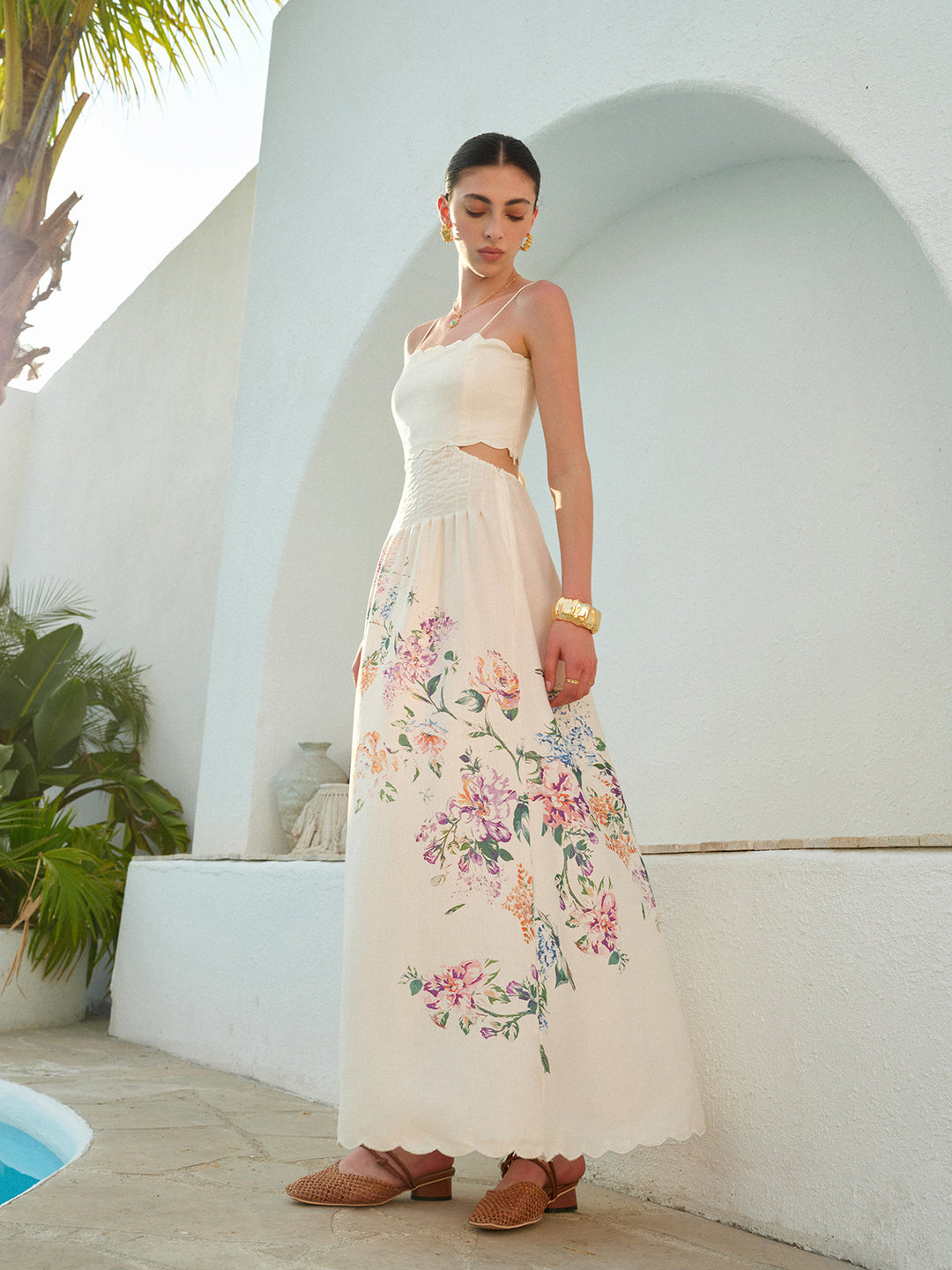 Elegant women's white boho maxi sundress with flowy fabric, ideal for summer and beachwear.