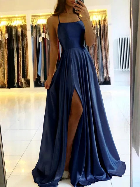 Women's graceful flowing maxi dress with a sophisticated side slit, offering comfort and elegant style.