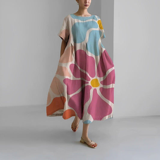 Flowy Boho summer dress with romantic floral print, offering a chic and timeless look, perfect for warm-weather occasions.
