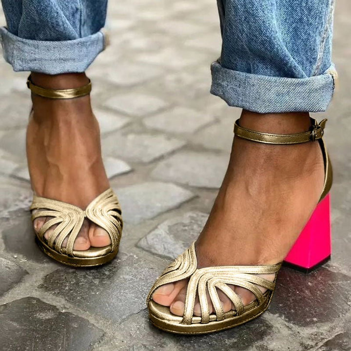 Gold multi-strap block heel sandals for women with an open toe and ankle strap, perfect for summer evenings.