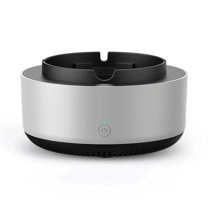 "Gray portable smokeless ashtray with air purifier for home and car use, featuring a sleek design and cigarette slots."