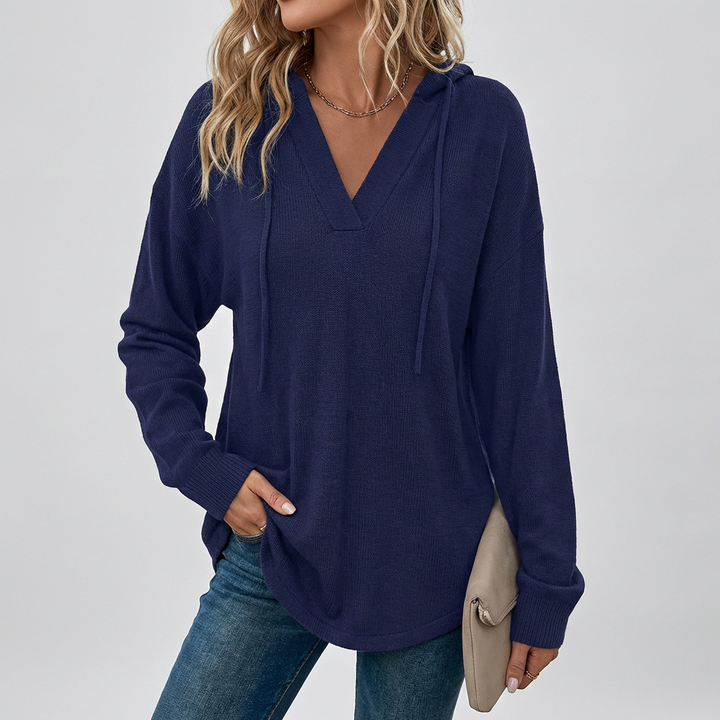 Fashionable women's oversized V-neck hoodie, designed for a relaxed fit and effortless comfort.