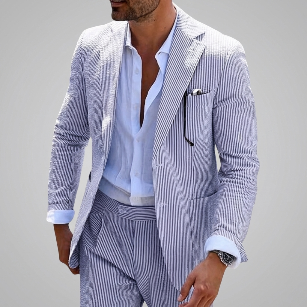 Sharp men's pinstripe summer suit in a two-piece slim fit design. Excellent modern choice for events & business.