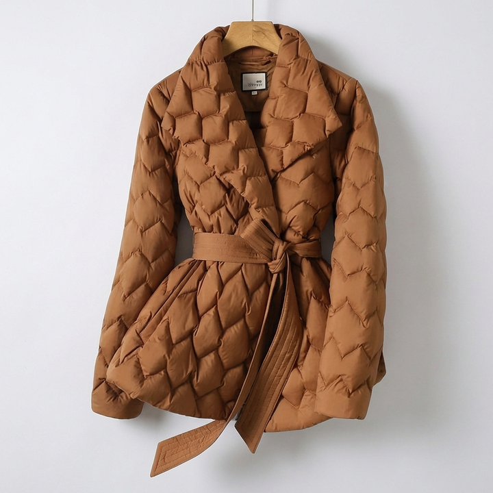 Fashionable women's long belted down coat. Quilted for ultimate winter warmth and elegant cold weather style.