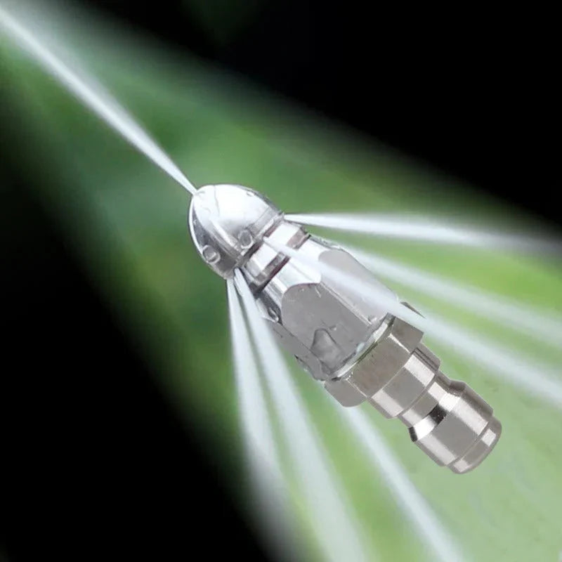 "High-pressure stainless steel sewer jetter nozzle, silver, with pointed tip for effective pipe cleaning and unclogging."