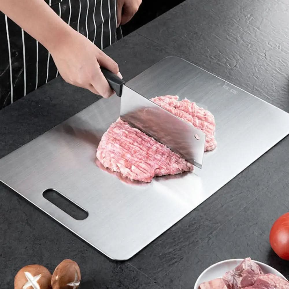 Modern stainless steel cutting board, ideal for chefs. Durable, scratch-resistant, and easy to clean for efficient food preparation.