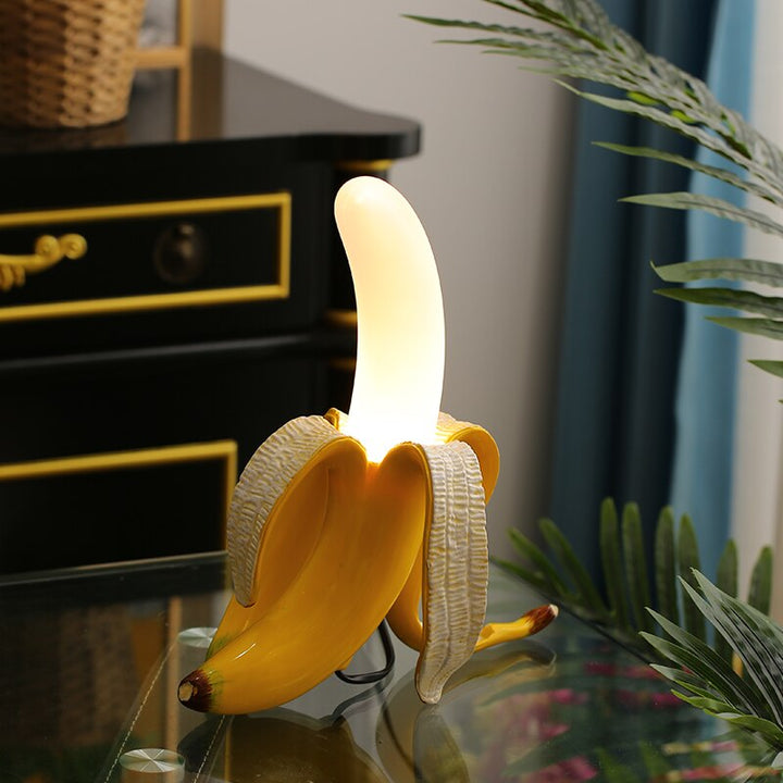 Stylish table lamp featuring brass and chrome, modern design, perfect for home decor.