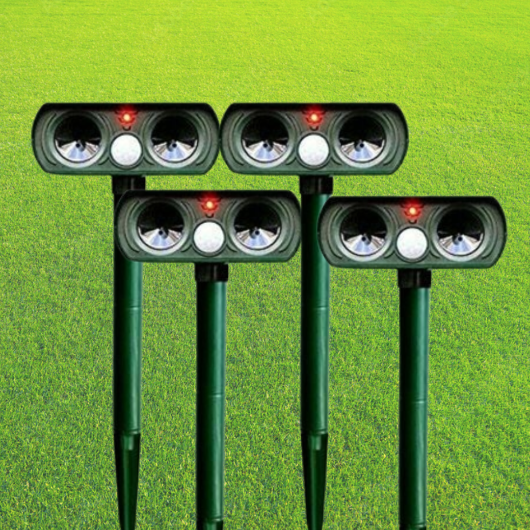 "Infrared Solar Ultrasonic Animal Repeller for garden protection, green device with solar panel and motion detector"