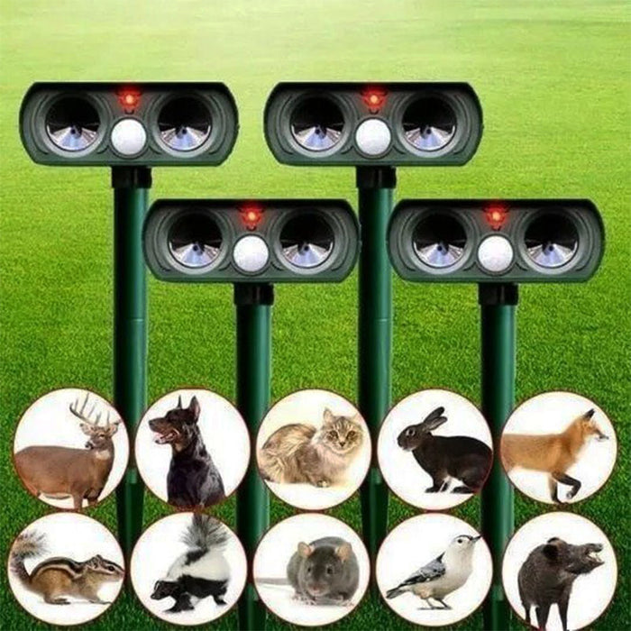 "Infrared Solar Ultrasonic Animal Repeller for garden protection, green device with solar panel and motion detector"