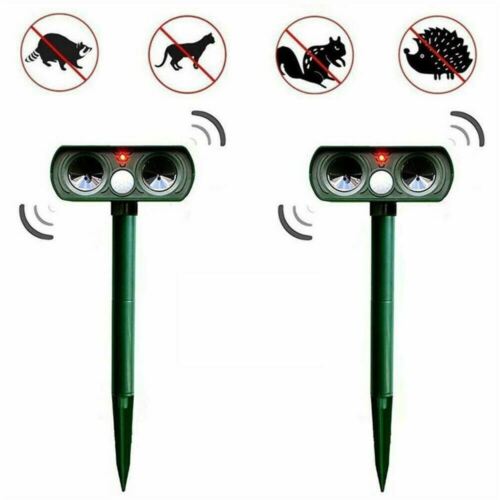 "Infrared Solar Ultrasonic Animal Repeller for garden protection, green device with solar panel and motion detector"