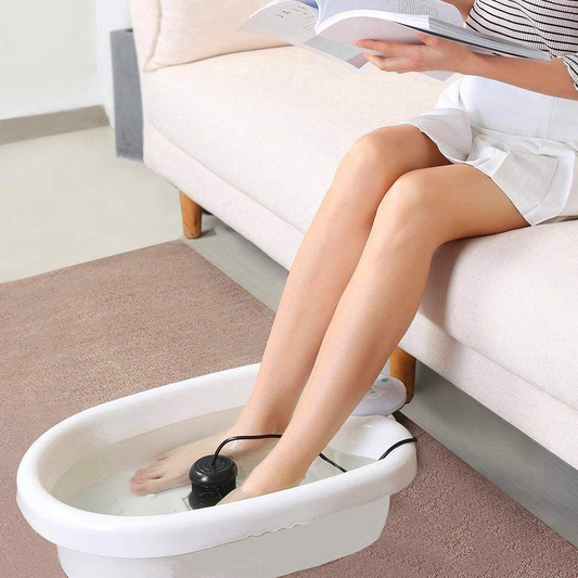 "Ionic detox foot bath machine with stainless coils, featuring a sleek basin design and user-friendly control panel."
