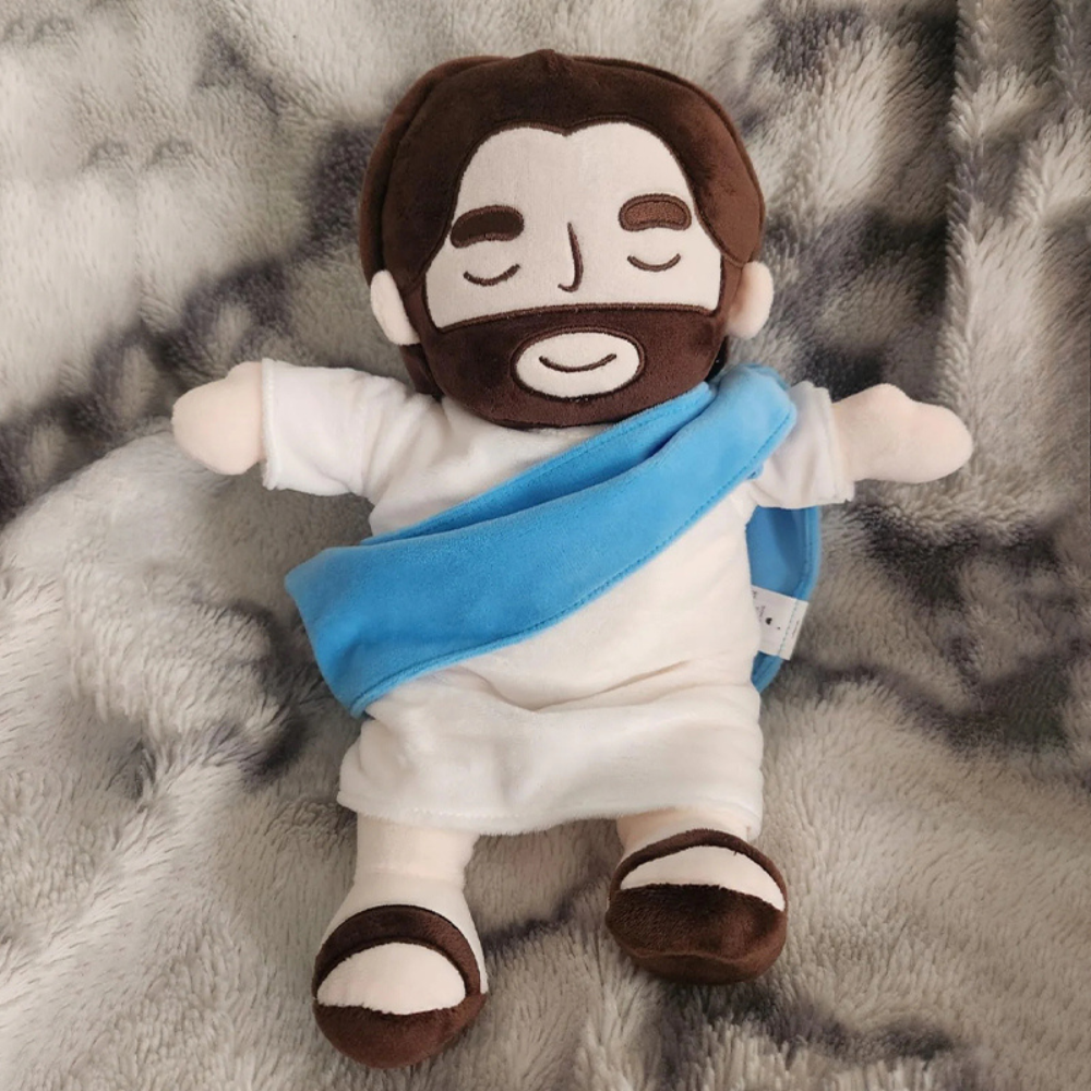 "Kids Soothing Jesus plush toy, soft with red and blue colors, serene smile, ideal for spiritual comfort and play."