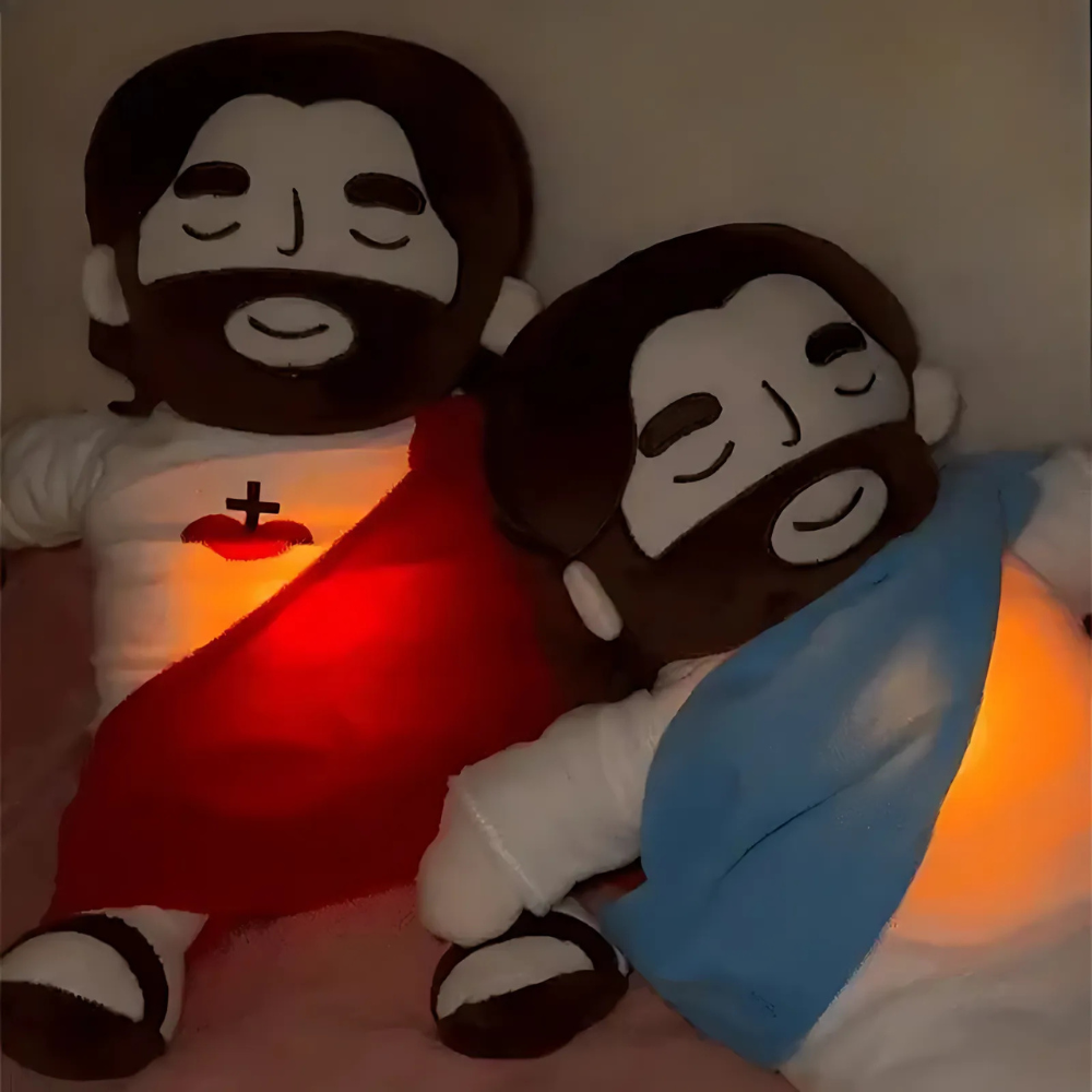 "Kids Soothing Jesus plush toy, soft with red and blue colors, serene smile, ideal for spiritual comfort and play."