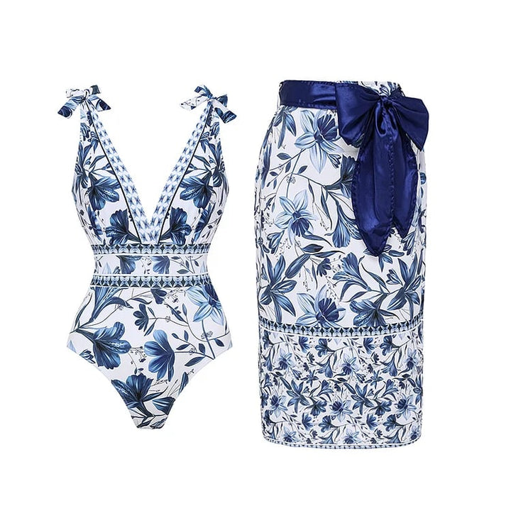 Women's elegant swimwear set including a two-piece swimsuit & matching beach skirt cover-up.