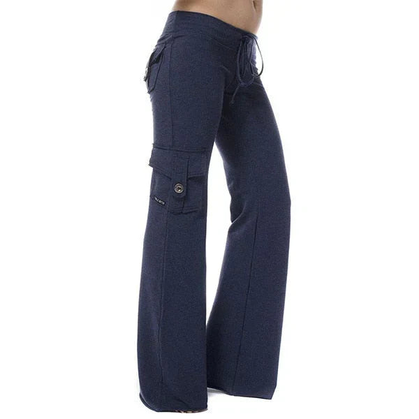 Stylish women's bootcut cargo pants with convenient pockets, great for travel.