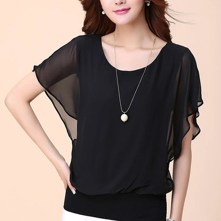 Versatile women's flowy blouse with ruffles. Perfect elegant shirt for office or daily wear.