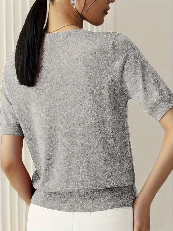 Women's lightweight short sleeve sweater, great for breezy spring casual wear.