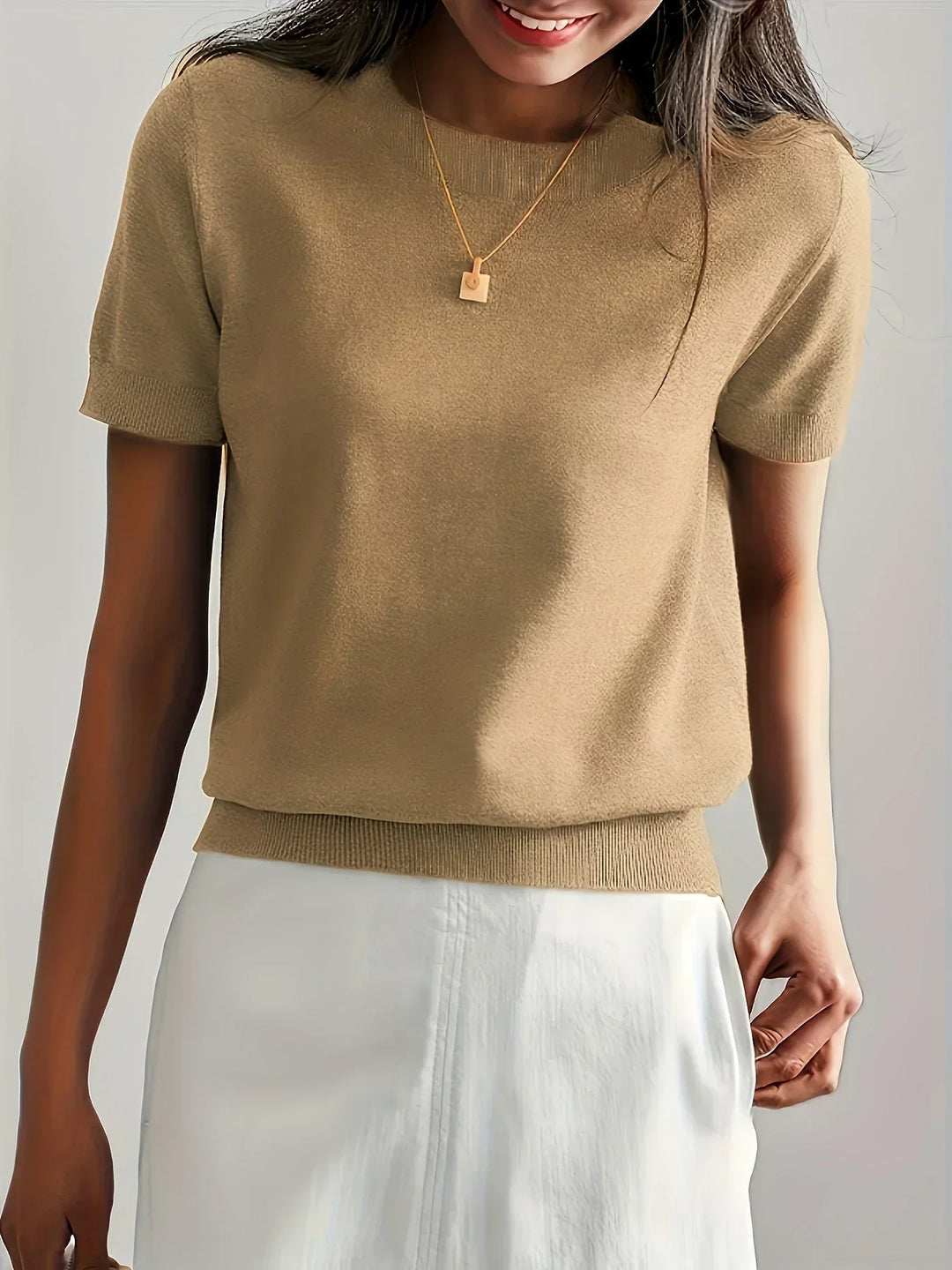 Fresh women's short sleeve sweater, lightweight knit for easy spring style.