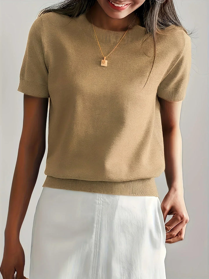 Fresh women's short sleeve sweater, lightweight knit for easy spring style.