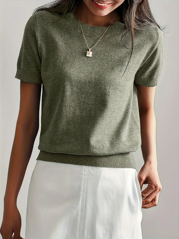 Casual ladies short sleeve top, a soft knit for versatile spring fashion.