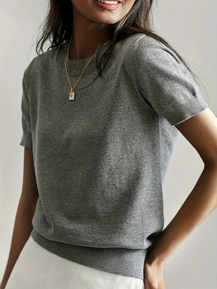 Women's lightweight short sleeve spring sweater, perfect for casual everyday style.