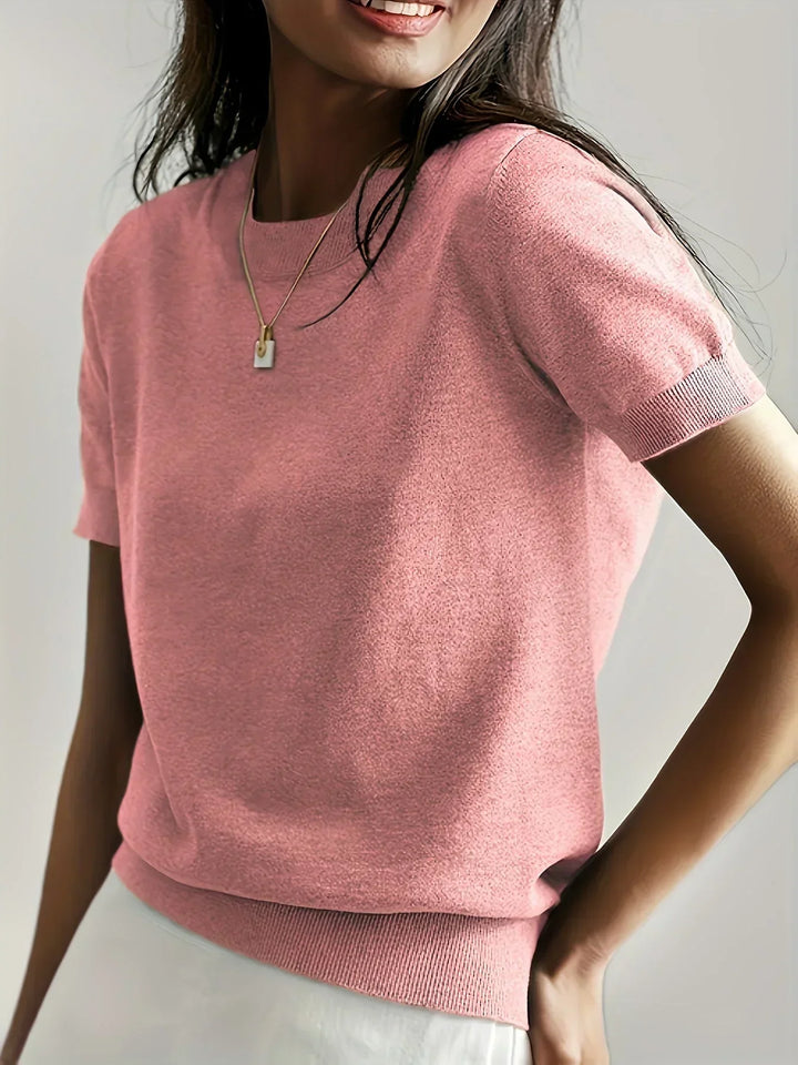 Modern women's spring sweater, short sleeve and comfortable for everyday style.
