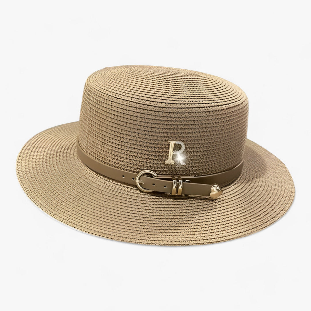 Elegant women's flat crown summer hat, Aurelle, perfect for beach trips & sun protection. Stylish vacation accessory.
