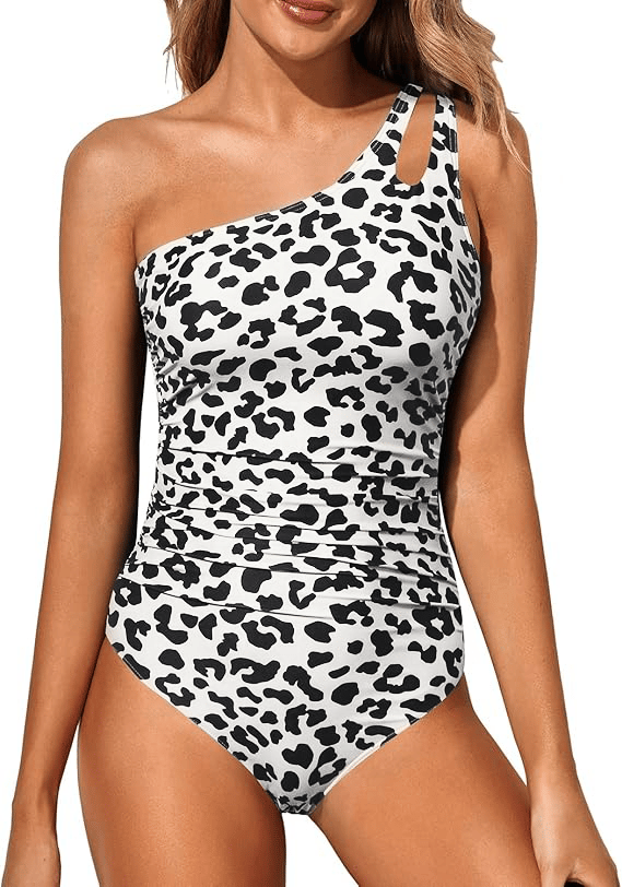 Flattering women's one-shoulder beachwear, offering tummy control for a sleek summer.