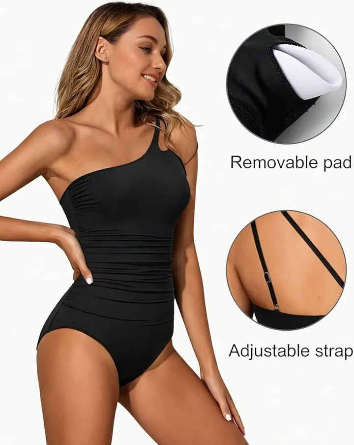 Flattering one-shoulder women's swimsuit, providing tummy control for a confident beach day.