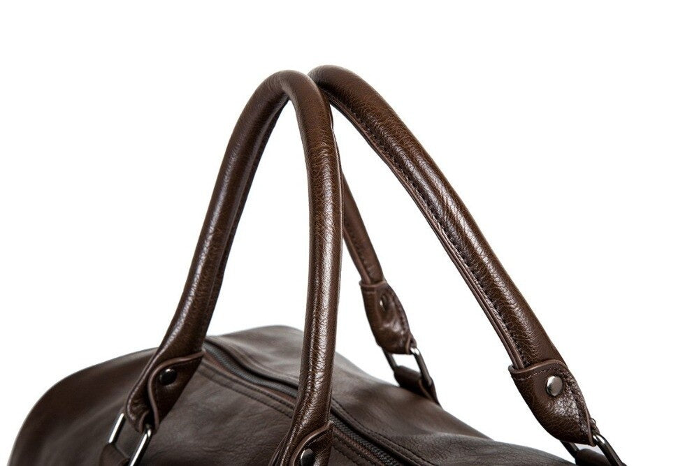 Unisex large lightweight duffel, sleek black faux leather, versatile for gym, travel, or weekend.