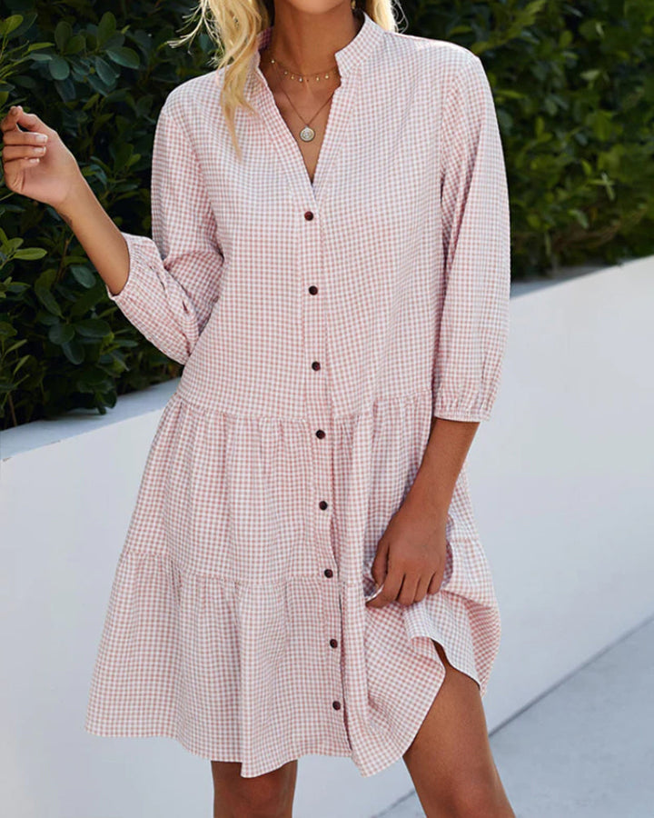 Patterned A-line summer dress for women. Classic checked design, elegant and breathable fabric.