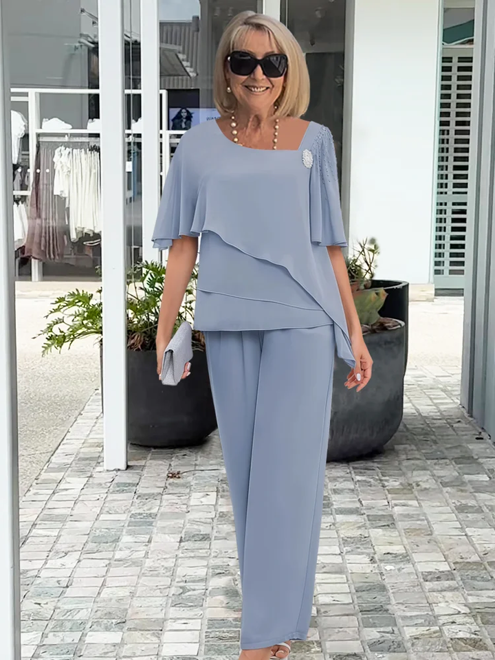 Light blue women's chic two-piece top & pants set, perfect for casual spring and summer fashion. Everyday comfort.