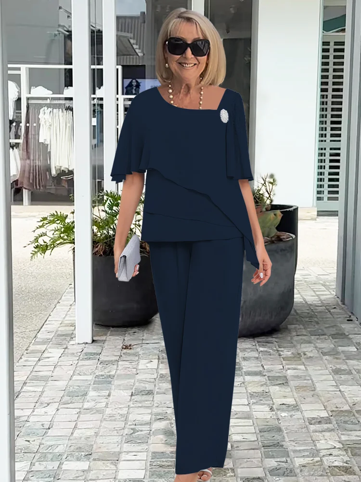 Elegant navy blue women's two-piece set with matching top & pants. Ideal for travel or cozy everyday wear.