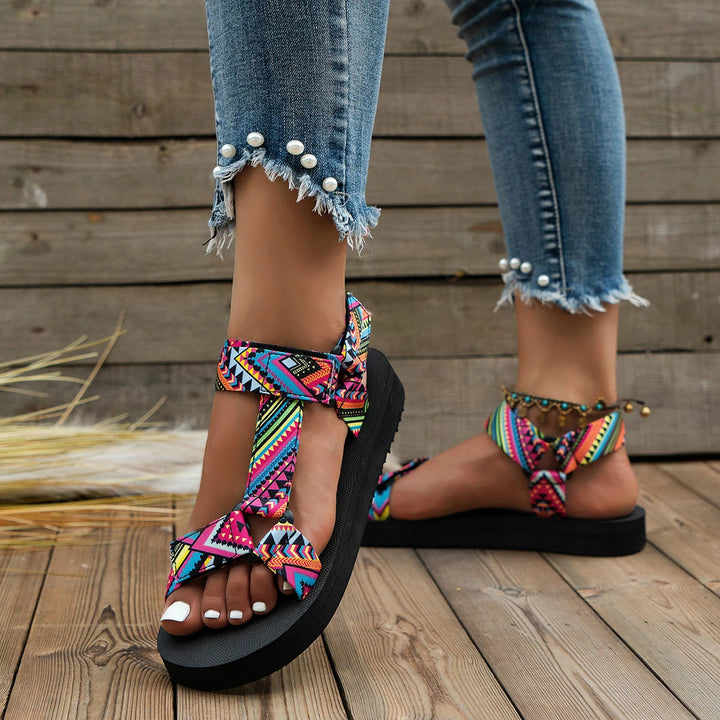 Stylish women's colorful open-toe sandals worn on foot, showcasing lightweight and comfortable design for spring summer.