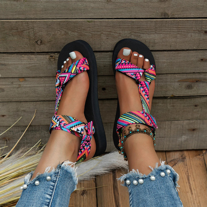 Top view of vibrant Amélie women's summer sandals, featuring colorful straps and comfortable open-toe design for fashion.