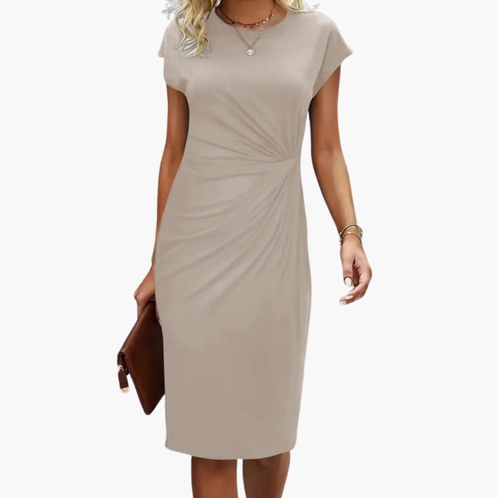 Women's flattering fit midi dress, featuring an elegant round neck & short sleeves for comfortable wear.