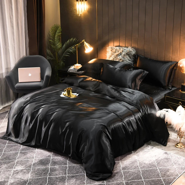 Elegant satin duvet cover, fitted sheet & pillowcases for a luxurious and comfortable bedroom set.