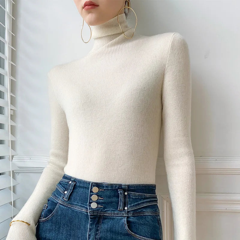 Women's soft cashmere turtleneck sweater, a luxurious knit essential for comfortable winter layering.
