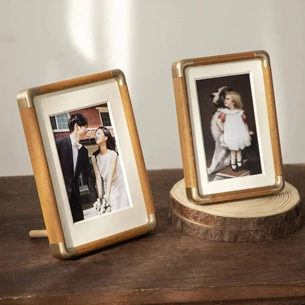 Sleek clear acrylic photo frame with magnetic closure. Ideal for modern desk decor & double-sided picture display.