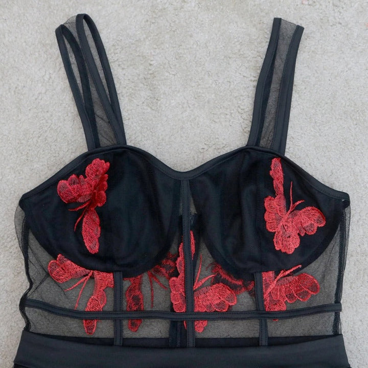 Beautiful women's empire waist maxi dress with floral embroidery & thin spaghetti straps, ideal for special occasions.