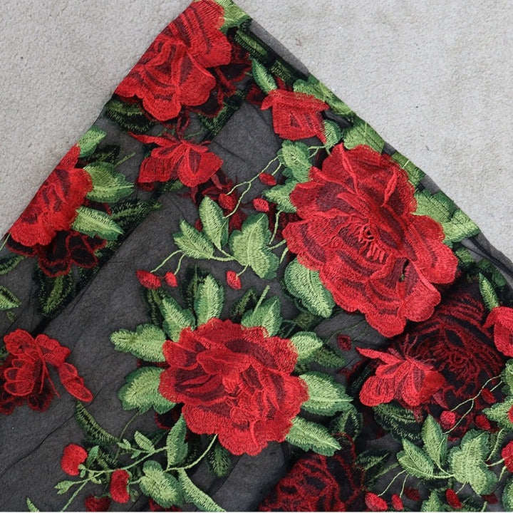 Summer floral embroidered spaghetti strap maxi dress for women, an elegant sleeveless party or vacation outfit.
