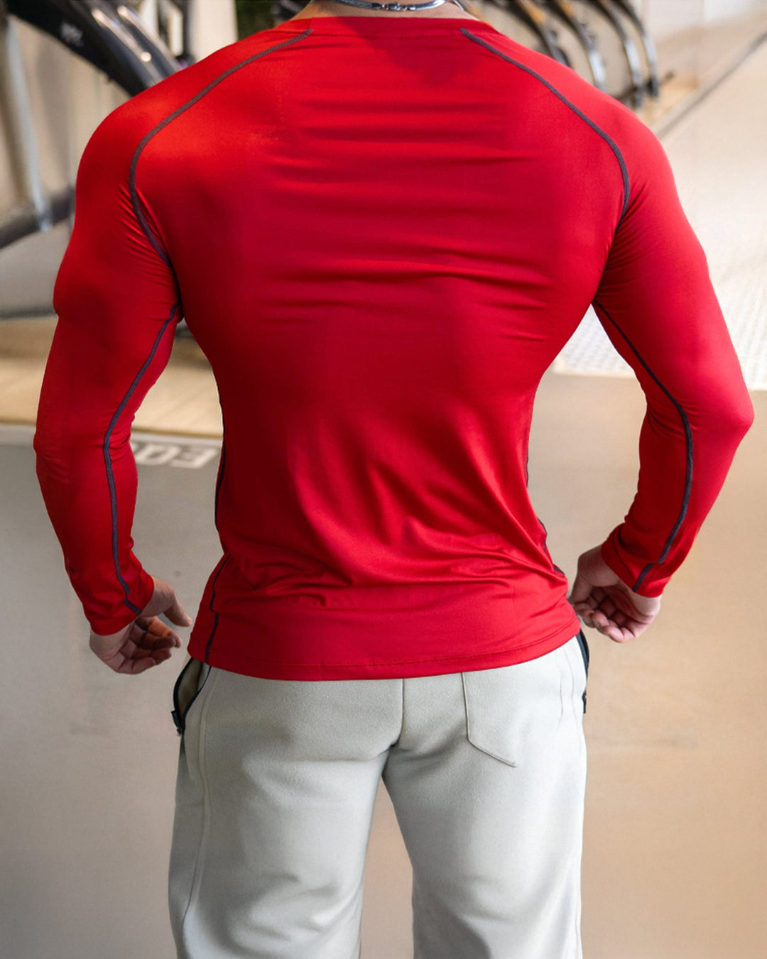 Moisture-wicking men's long sleeve performance shirt, blue, for maximum comfort in gym