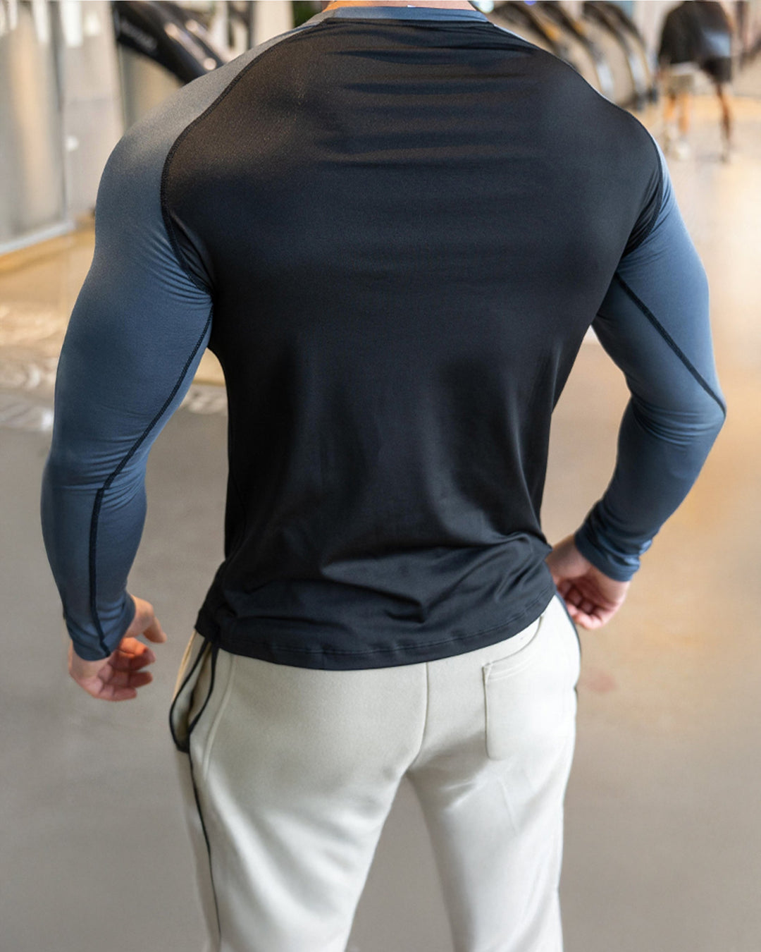 Versatile men's athletic long sleeve shirt, shoulder cut, perfect for any active lifestyle