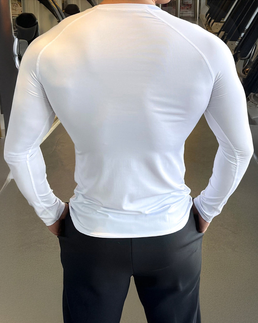 Grey men's athletic shoulder cut long sleeve shirt, offering superior comfort and fit