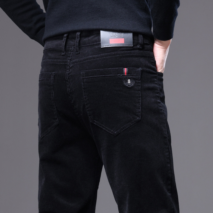 Men's black corduroy tailored trousers, perfect for smart casual or formal occasions. Comfortable & stylish.