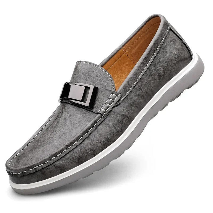 Stylish men's leather dress shoes, versatile for both casual & semi-formal looks.
