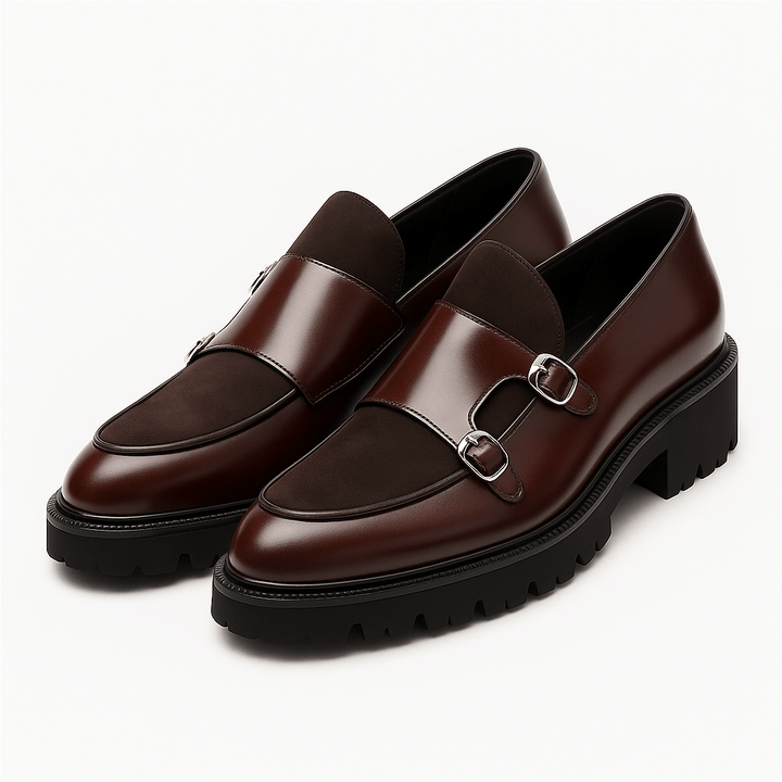 Men's black leather monk strap loafers with double buckles. Sophisticated slip-on dress shoes for modern style.